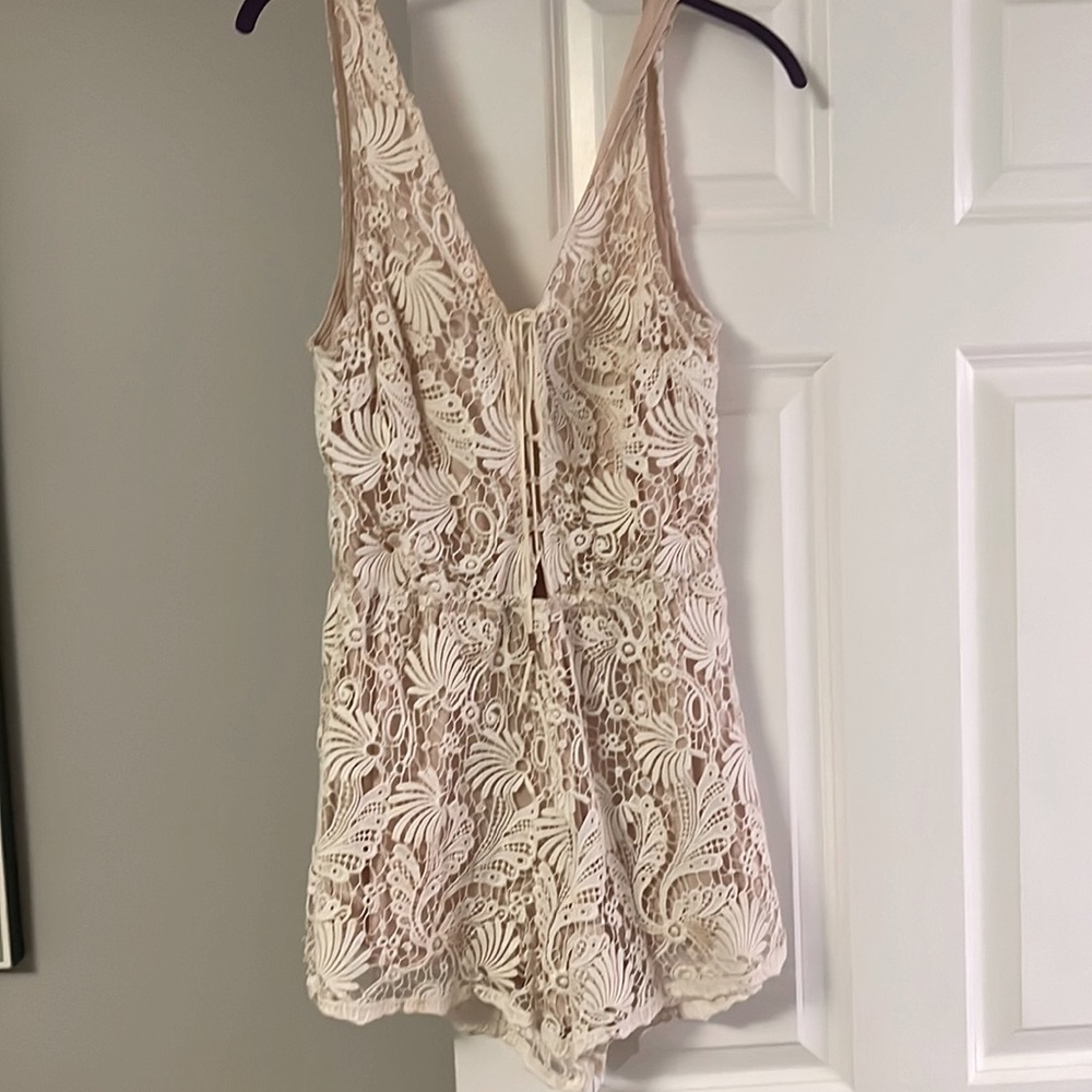 Winston white size medium romper with lace!